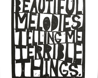 Tom waits quote BLACK linocut block print typography - I like beautiful melodies telling me terrible things 8x10 - Paper cut style