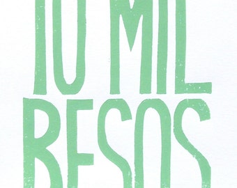 10 mil besos in light green (Ten thousand kisses) Spanish letterpress typography linocut poster 8x10 - Sea foam green linoleum block relief