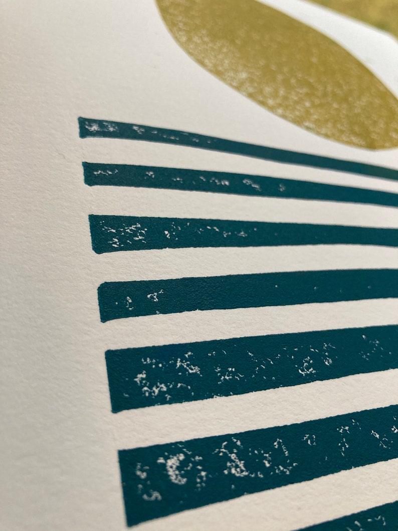 May include: Abstract art print with a large, off-white circle and horizontal teal stripes.