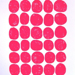 May include: A white background with a grid of 36 bright pink circles.