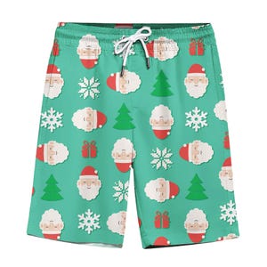 以下が含まれることがあります： 緑色のクリスマスをテーマにした水着のショートパンツ。ウエストはゴム入りで、白い紐が付いています。サンタの顔、雪の結晶、クリスマスツリー、ギフトボックスの模様が施されています。サンタの顔は赤い帽子と白いひげをしています。