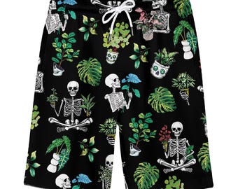 May include: Black swim trunks with a repeating pattern of skeletons holding potted plants. The plants are various shades of green and have white flowers.