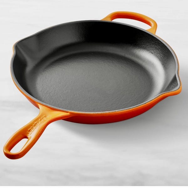 Poêle Le Creuset Enamel de 11 3/4 po. de couleur « Flame » orange