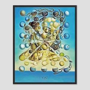 May include: A framed surrealist print featuring a portrait composed of floating spheres in shades of yellow, brown, and blue against a light blue background. The artwork is signed in the lower right corner.