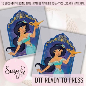 May include: A digital transfer design featuring a cartoon image of Princess Jasmine from Disney's Aladdin. She is holding a golden lamp. The design is ready to be pressed onto a t-shirt or other fabric.