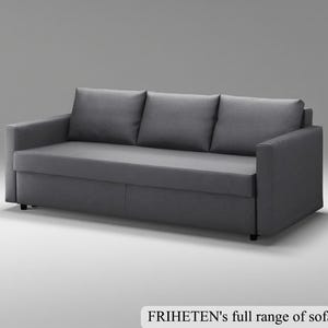 May include: A gray three-cushion sofa with three matching back pillows and armrests. The sofa is a neutral color and has a simple, modern design. The text at the bottom reads: FRIHETEN's full range of sofa covers.