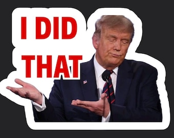 May include: A sticker featuring a photo of a man in a suit with the text "I DID THAT" in red letters.