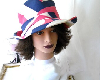 vintage go-go circa. 1963 creamy white, navy blue, and pink top hat shaped groovy, hollywood prop