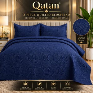 May include: A 3-piece navy blue quilted bedspread set featuring a repeating circular pattern. The set includes a large bedspread and two matching pillow shams, all displaying a textured, stitched design. The text Qatan 3 Piece Quilted Bedspread is visible at the top, with additional icons and text labels at the bottom.