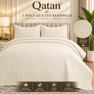 May include: A cream-coloured 3-piece quilted bedspread set by Qatan featuring a repeating circular pattern. The set includes a large bedspread and two matching pillow shams, all displaying intricate stitched textures and premium quilting detail.