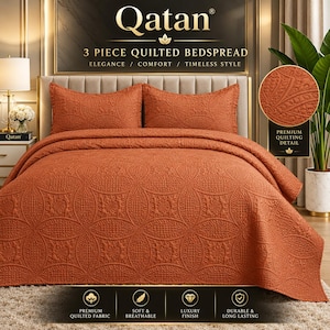 May include: A 3-piece quilted bedspread set in a solid burnt orange color featuring a repeating circular and floral embossed pattern. The set includes a large bedspread and two matching pillow shams, all displaying a consistent textured design.