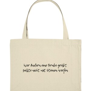 Celui qui creuse une fosse pour les autres est noir - Sac de courses bio
