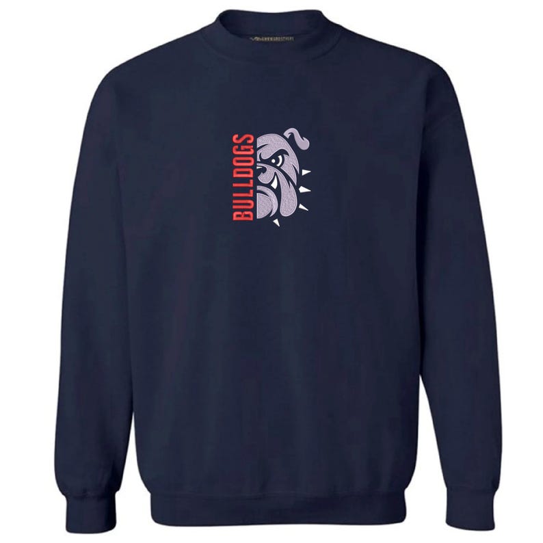 May include: Navy blue sweatshirt with a crew neck. The front features a bulldog graphic in gray and white, with the word "BULLDOGS" in red vertically on the left side. The sweatshirt is a solid color and has long sleeves.