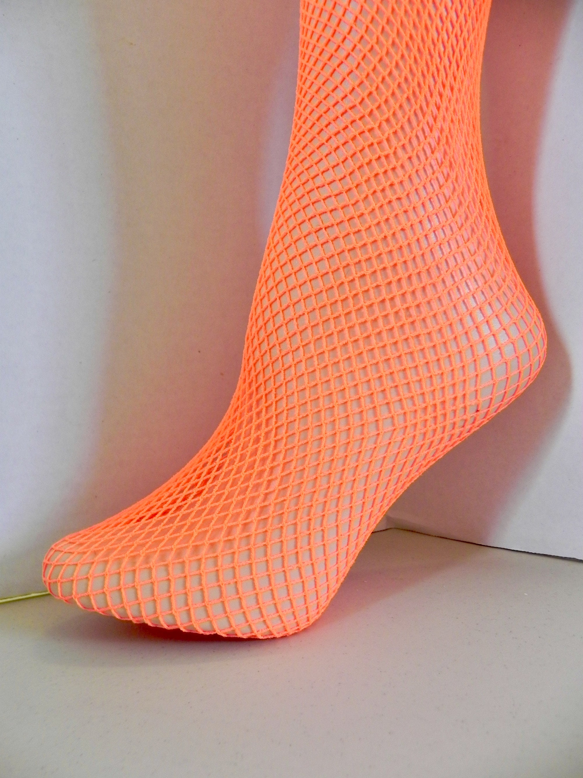 Neon orange fishnet socks hotsell