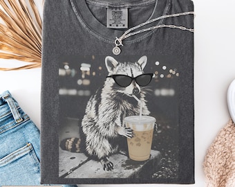 Raccoon Drinking Iced Coffee Shirt, Funny Animal Meme Graphic Top, Coffee Lover Gift, Cute Raccoon Apparel, Unisex Trendy Outfit
