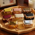 Genuine Leather Mini Jewelry Box, Small Jewelry Case, Coin Purse with Kiss Lock, Portable Travel Mini Jewelry Case Organizer product logo