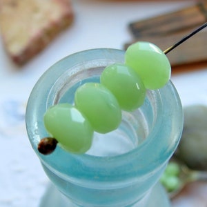 JADEITE GREEN RONDELLES .  10 Czech Faceted Glass Beads . 6 by 9 mm beads . Supplies for Jewelry Making