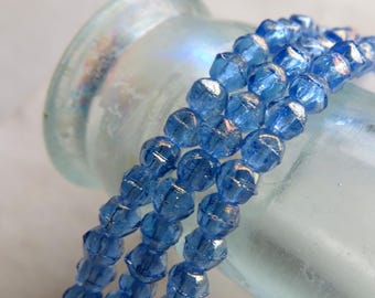 50 cuentas de cristal checo color zafiro: acabado iridiscente brillante, 3 mm. Materiales para la fabricación de joyas.