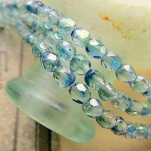 Czech Glass Beads: 4mm Swirled Blue Luster, Fire Polish (50)