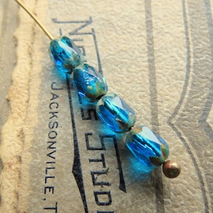 Aqua Picasso Czech Glass Beads: Faceted Ovals, 6x4mm, 20pc