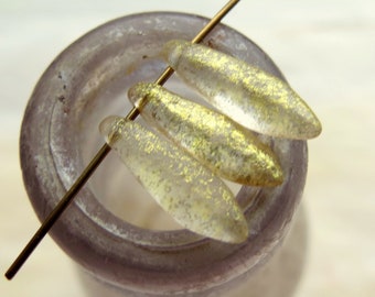 May include: Four iridescent glass beads with gold flecks, strung on a wire.