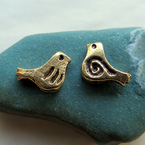 AGED GOLD BIRDIEZ . 2 Mykonos Bird Charms . 12 mm . Greek Charms, Pendants and Buttons . Supplies for Jewelry Making