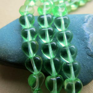 New GREEN PERIDOT HEARTS . 50 Czech Glass Polished Heart Beads . 6 mm beads . Supplies for Jewelry Making