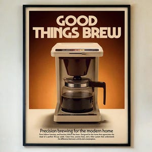 May include: Framed poster with a retro-style coffee maker illustration. The poster has the words "GOOD THINGS BREW" in bold, white letters. Below the coffee maker, the text reads "Precision brewing for the modern home". The poster is in a black frame.