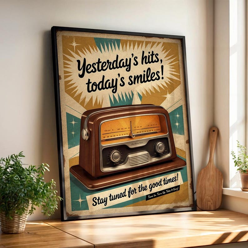 May include: A framed vintage-style poster featuring a brown radio with a yellow dial. The poster has the text "Yesterday's hits, today's smiles!" and "Stay tuned for the good times!" against a cream and teal background.