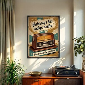 May include: A framed vintage-style poster with a brown radio illustration. The poster has the text "Yesterday's hits, today's smiles!" and "Stay tuned for the good times!" in a retro font. The poster is displayed on a wall.