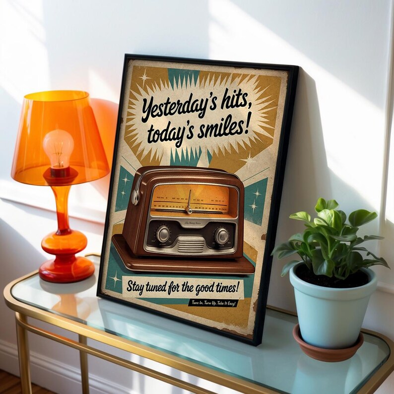 May include: A framed vintage-style poster with the text "Yesterday's hits, today's smiles!" and "Stay tuned for the good times!". The poster features a brown radio illustration. An orange lamp and a potted plant are also visible.