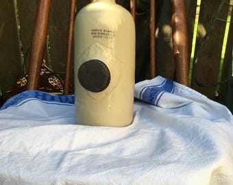 Vintage stoneware foot warmer with quirky instructions
