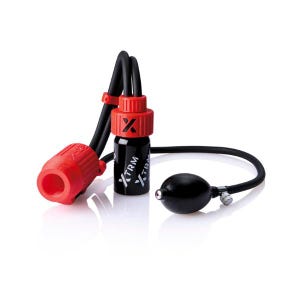 May include: A black bottle with red accents and the text "XTRM" is connected to a black tube and a red nozzle. A black bulb is also connected to the tube. The product is on a white background.
