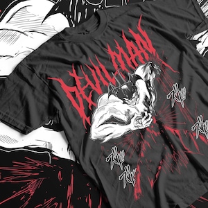 May include: Black t-shirt with a white graphic of a character with horns and the text "DEVILMAN" in red.