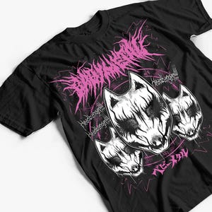 May include: Black t-shirt featuring a pink graphic design. The design includes stylized text and three white wolf-like masks. The text "Headbanger!!!" is repeated, and Japanese text is also present.