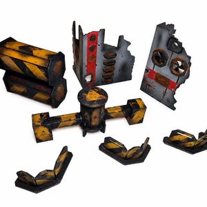 May include: A collection of miniature wargaming terrain pieces featuring industrial ruins, barricades, and pipes. The items are painted with weathered yellow and black hazard stripes, grey concrete textures, and red accents on the wall sections.