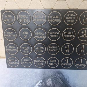 Tokens modificadores para jogos de mesa