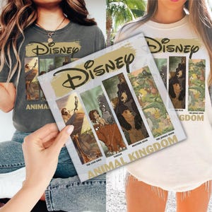 May include: Two t-shirts, one gray and one cream, featuring the Disney logo and images from animated films. A person holds a magazine with Disney movie scenes, including The Lion King, Tarzan, and The Jungle Book. The magazine reads "ANIMAL KINGDOM."