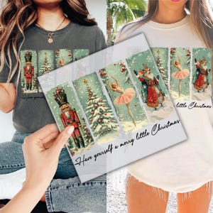 May include: Two white t-shirts with a vintage Christmas design featuring a nutcracker, a Christmas tree, a ballerina, and a mouse. The text on the shirts reads "Have yourself a merry little Christmas".