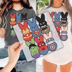 a woman holding up a picture of some cartoon characters