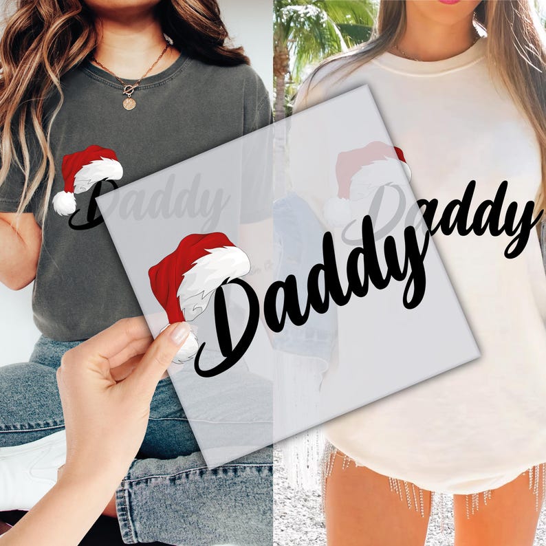 May include: Two t-shirts, one dark grey and one cream, each with a Santa hat graphic and the word "Daddy" in black script. The Santa hat is red with a white trim and a white pom-pom.