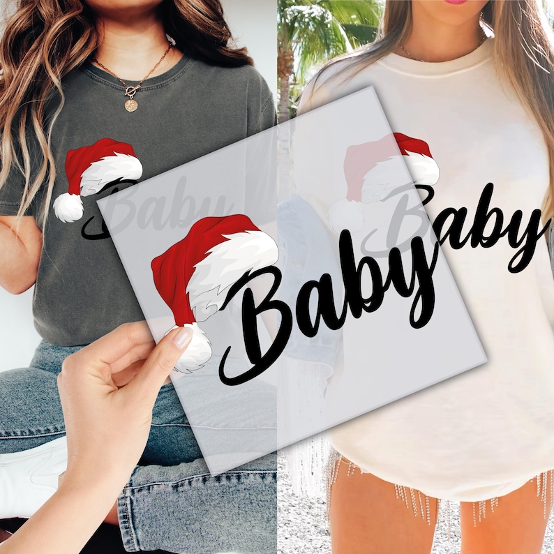 May include: Two shirts, one dark grey and one cream, each with a Santa hat graphic and the word "Baby" in a script font. The Santa hats are red with white trim and a fluffy white pom-pom.