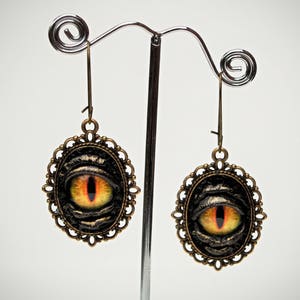 Dragon eye black leather earrings. Halloween earrings. Leather earrings. Dangle earrings. LARP. Horror leather jewelry. Gothic earrings.