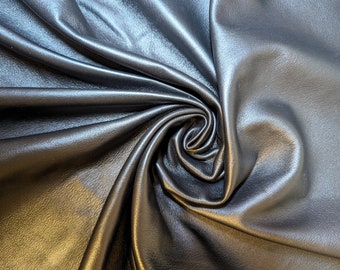 Black deerskin leather hide. Thin, Soft, Smooth finish. Garments, pouches, craft material. 5 sqft, 1.5 OZ . Made in Sweden.