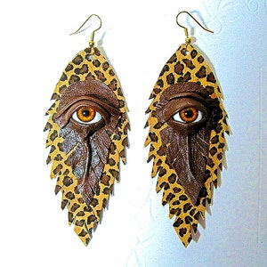 Evil eye brown leopard print leather earrings.  Leather Feather earrings. Halloween earrings. Dangle earrings. Evil eye earrings.