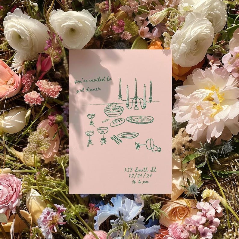 May include: A pink invitation card with green illustrations of a dinner table setting with candles, plates, glasses, and food. The text on the card reads "you're invited to girl dinner" and "123 Smith St 12/04/24 @ 6 pm".