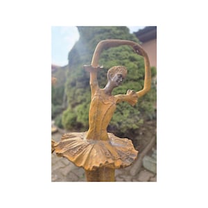 Antique rustic cast iron sculpture &quot;Ballerina&quot; high. Rustic figurine garden and home decoration. Beautiful and stylish cast iron sculpture