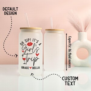 May include: Two frosted glass tumblers with bamboo lids and straws. One tumbler has the text "OH SIP! IT'S A Girl's Trip" with a red lip graphic and hearts. The capacity is 473 ml.