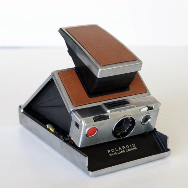 Polaroid SX70 Folding Camera  Instant Film Camera Cleaned, Tested, and Working brought to you by TheHeartTheHome on Etsy