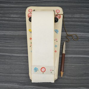 Vintage Roll-A-Note note memo pad holder wall hanging floral butterflies retro kitchen decor Japanese tin metal lithographed gift